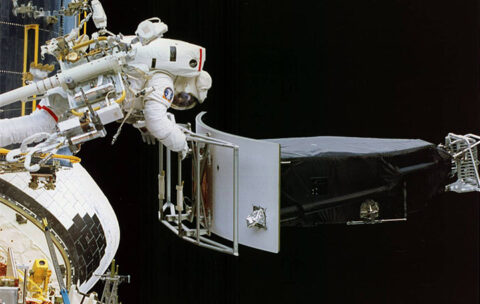 Astronaut Jeffrey Hoffman removes the Wide -Field and Planetary Camera 1 during the first Hubble repair mission, which corrected for the telescope’s flawed mirror, in December 1993. Credit: NASA