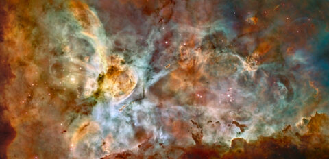 This composite image of the Carina nebula, a Milky Way star-forming region about 7,500 light-years from Earth, combines high-resolution Hubble observations taken at a single wavelength with a color palette derived from multiwavelength images recorded at CTIO in Chile. The image shows at least 12 bright stars that are 50 to 100 times as massive as the Sun. The image was released to celebrate Hubble’s 17th birthday. Credit for Hubble data: NASA, ESA, N. Smith (University of California, Berkeley), and The Hubble Heritage Team (STScI/AURA). Credit for CTIO images: N. Smith (University of California, Berkeley) and NOAO/AURA/NSF