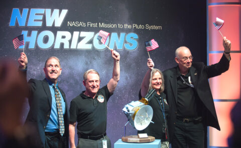 Officials with NASA and the New Horizons mission celebrate after confirmation that the Pluto-bound spacecraft successfully completed its flyby. Pictured, from left, are NASA Associate Administrator for the Science Mission Directorate John Grunsfeld, New Horizons Principal Investigator Alan Stern, New Horizons Mission Operations Manager Alice Bowman, and New Horizons Project Manager Glen Fountain. Credit: NASA/Joel Kowsky
