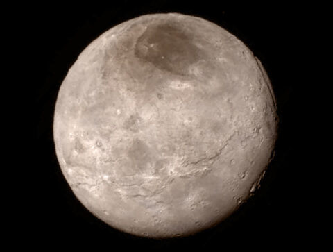 A swath of cliffs and troughs stretches about 600 miles (970 kilometers) from left to right across Pluto’s largest moon Charon, suggesting widespread fracturing of Charon’s crust, possibly a result of internal processes. The New Horizons spacecraft took this photograph Monday, 13 July, with its Long Range Reconnaissance Imager (LORRI). Credit: NASA/JHU APL/SwRI