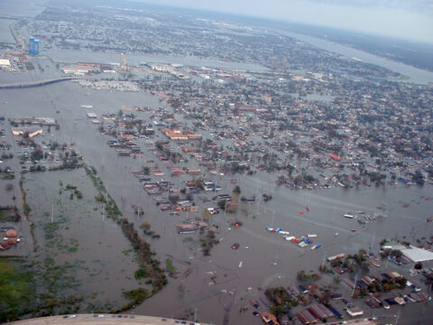 An aerial photograph from one of the first New Orleans fly overs shows the flooding as a result of the breeched levees following Hurricane Katrina. Photo taken 29 August 2005 Credit: Marty Bahamonde/FEMA