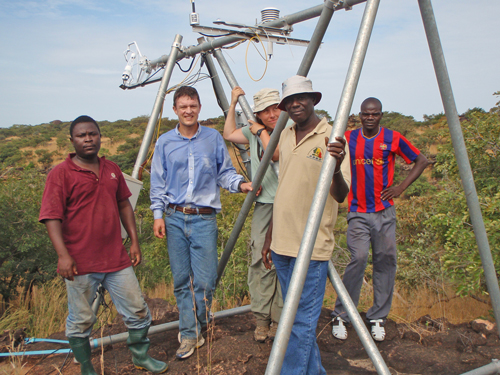 Environmental sensor stations in southeastern Burkina Faso monitor hydrological markers such as humidity, precipitation, and soil moisture. These researchers rely on measurements by their stations to analyze feedbacks between rainfall and land use, a critical topic for water resources managers in a region where natural savannah forests are quickly giving way to agricultural fields. Water Resources Research has included a paper on this research in a special section commemorating 50 years of the journal’s publication. Credit: Sabordja Koare
