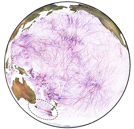 Fig. 1. Global numerical models of underwater tidal wave generation suggest that distinct tidal beams (pathways of tidal energy) cross the global ocean. Scientists have identified many of these, including the trans-Tasman beam (inside dotted circle), in satellite altimetry data. Here, tidal crests (red) and troughs (blue) are shown as a snapshot in time.