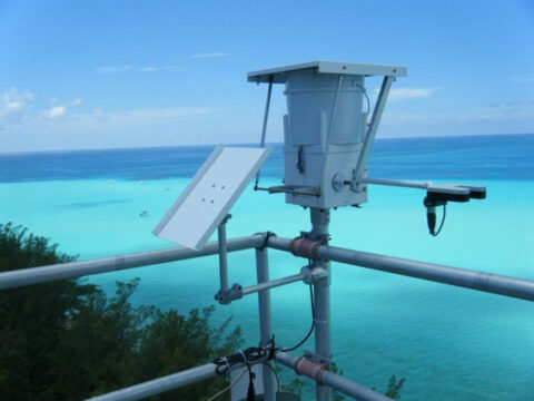 Scientists used this precipitation collector on the top of a research tower in Bermuda to collect rainwater samples. Along with aerosols, they analyzed these samples for nitrate, ammonium, and organic nitrogen. Credit: Katye Altieri