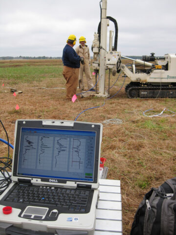 KGS direct-push crew (left: field hydrogeologist Ed Reboulet and right: scientist and project leader Jim Butler) works on the MADE site in the fall of 2008. Credit: Steven Knobbe