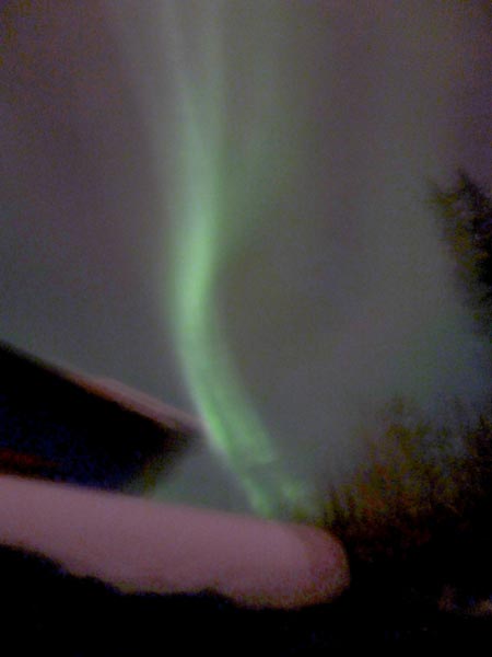 Auroral image taken after a record-setting snowstorm during the AGU Chapman Conference on Magnetospheric Dynamics.
