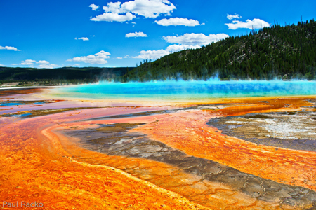 Steam rises from the hydrothermal Grand Prismatic Spring in Yellowstone National Park, Wyoming.