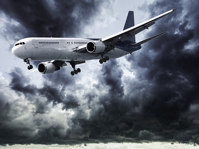 Airplane in storm clouds