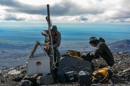 Crews work on a seismic station on the northern flank of Alaska’s Veniaminof Volcano.
