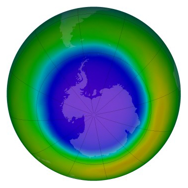 A false-color image of Antarctica’s ozone hole in September 2000, which covered 25 million square kilometers. The hole has shrunk 4.5 million square kilometers since then. Purple tones indicate areas of lowest ozone concentrations. Credit: NASA/GSFC