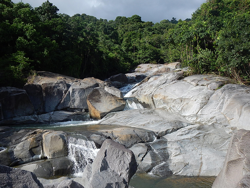 Water flows along a knickpoint in the Luquillo Mountains.
