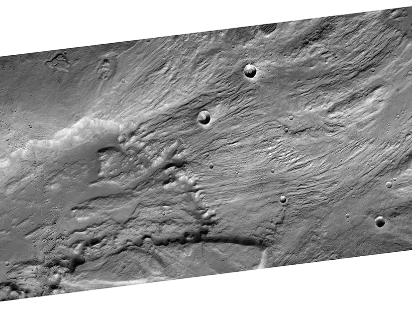 The ancient megafloods that carved canyons on Earth and Mars may have been smaller—but lasted longer—than previously thought.
