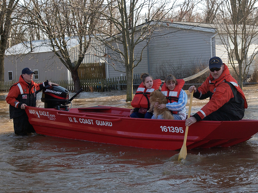 Disaster response team rescues flood victims