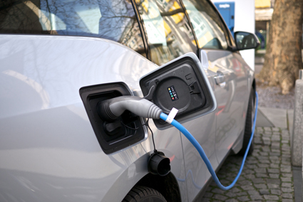 Electric car at a charging station.