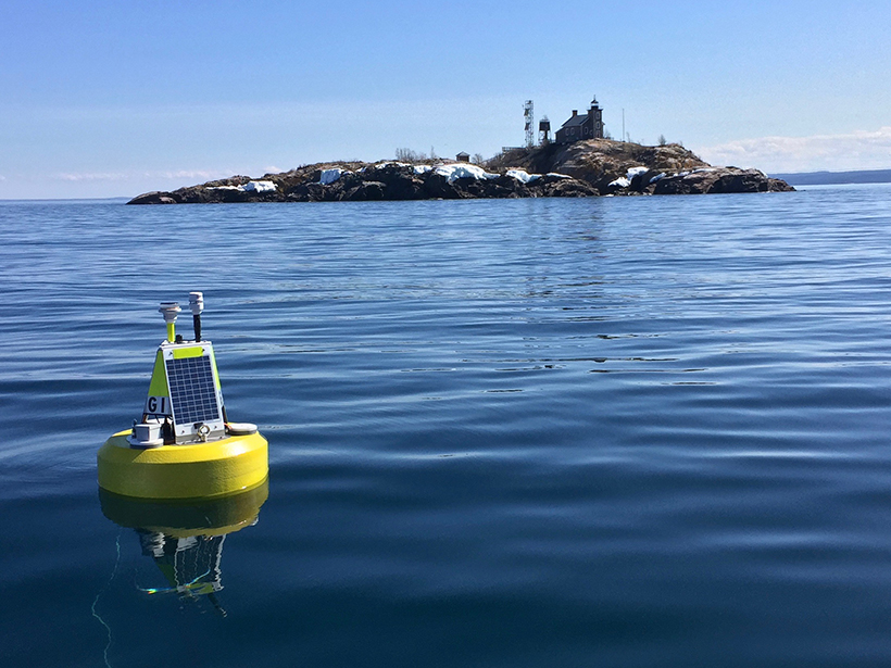 Environmental data buoy at Granite Island Light Station, a Great Lakes Evaporation Network site on Lake Superior.
