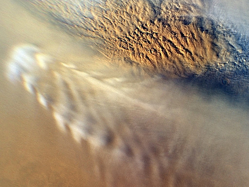 Clouds from a dust storm in Mars's atmosphere..