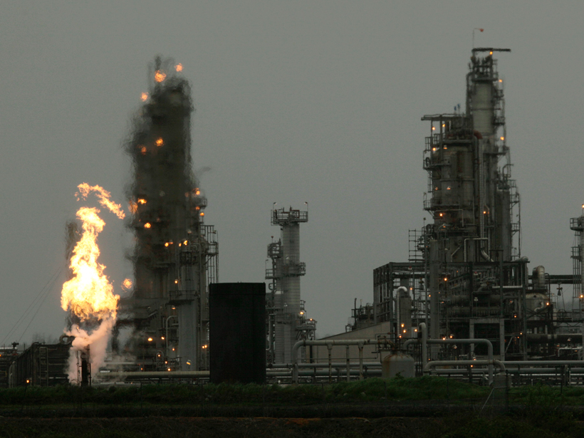 Refinery, including a gas flare flame that is part of the plant’s normal operations, in Anacortes in Washington.