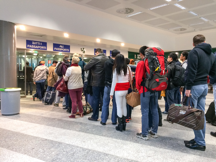 Travelers in line.