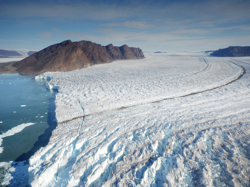 A large crack splits the ice about 100 meters from the face of Bowdoin Glacier.