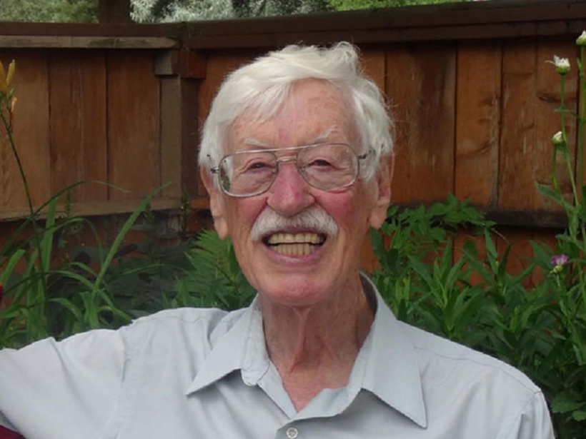 Auroral physicist Dave Evans relaxes in his garden in Boulder, Colo