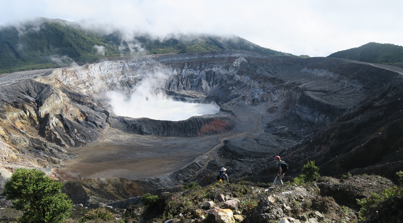 Scientists hike down to Laguna Caliente.
