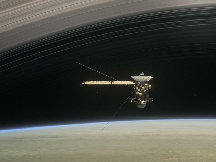An artist’s rendition of Cassini’s orbit between Saturn and its rings.