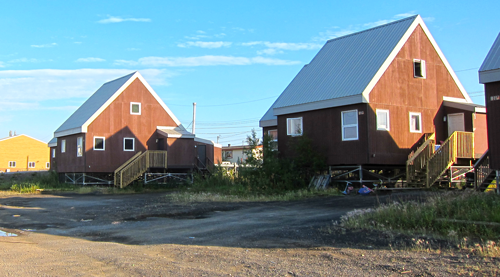 Buildings in Inuvik sit about a meter or more above the ground, resting on buried stilt-like pilings or metal frameworks