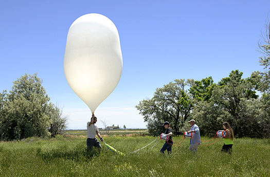 Students with high altitude balloon
