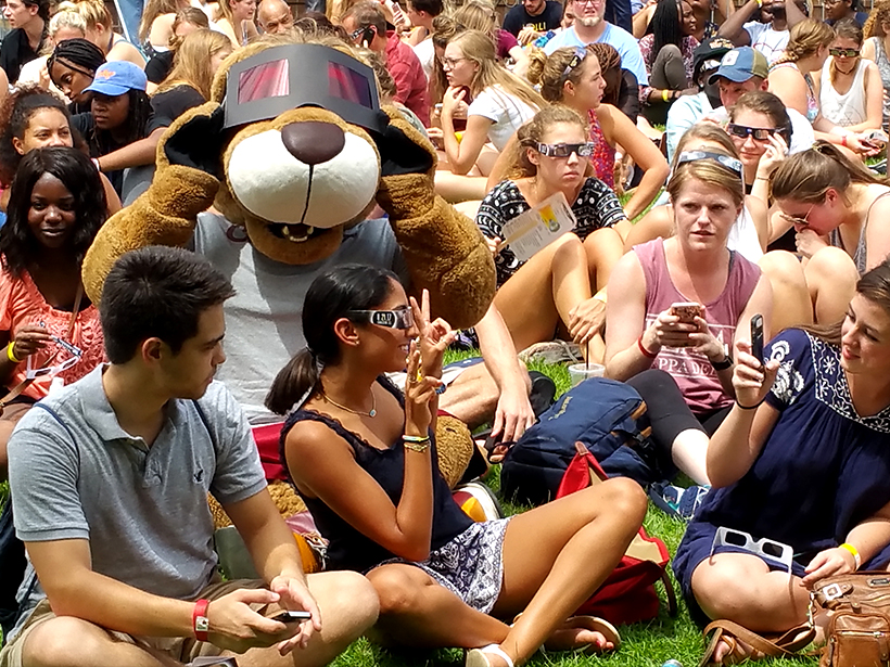 A crowd waits for totality at a 21 August 2017 eclipse viewing party in South Carolina.