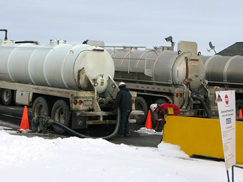 Oil field waste arrives at a wastewater disposal facility near Platteville, Colo.