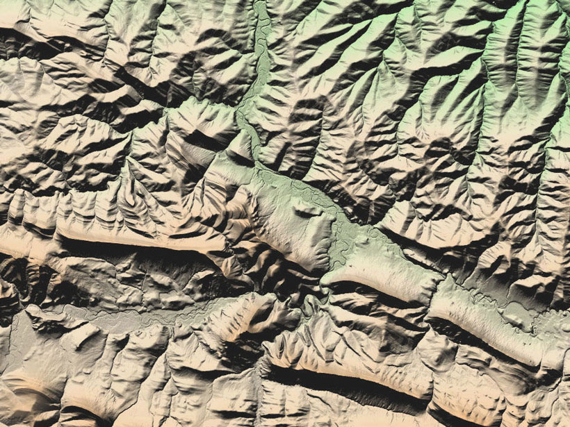A color-shaded relief image made from the 5-meter mosaic of ArcticDEM shows a portion of the Brooks Range on the North Slope of Alaska
