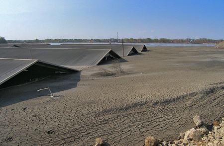 Village buried by mud from the Lusi mud volcano.