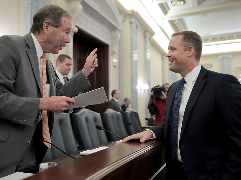 Rep. Jim Bridenstine chats with Sen. Tom Udall before Bridenstine’s nomination hearing to be NASA administrator.
