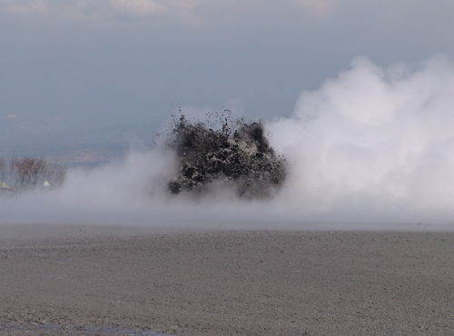 The Lusi eruption spewed boiling mud tens of meters high during one of the active geysering phases in September 2006.