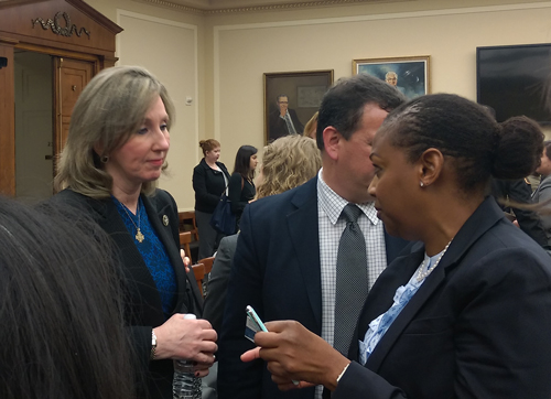 Subcommittee chairwoman Barbara Comstock (left) speaks with witness Rhonda Davis of NSF.