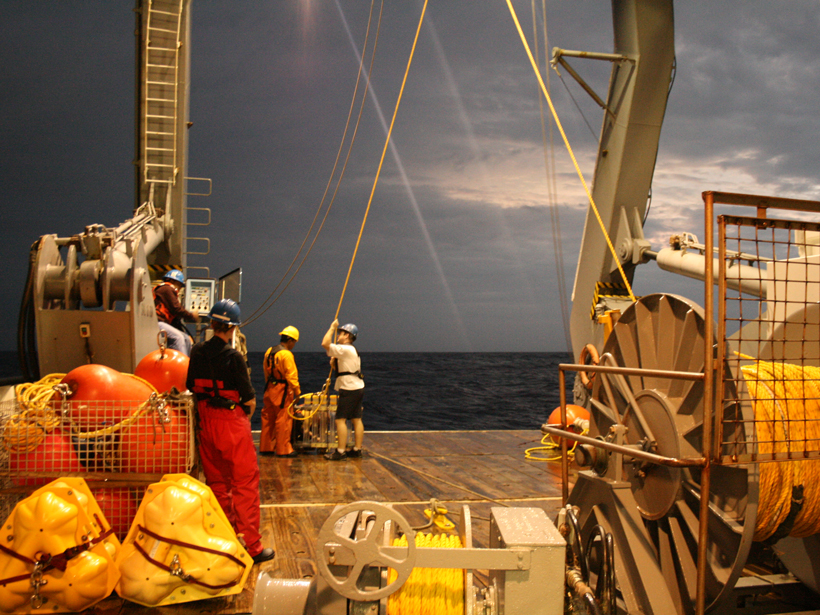 Crew aboard the R/V Atlantic Explorer deploy equipment that will collect data for the Bermuda Atlantic Time Series.