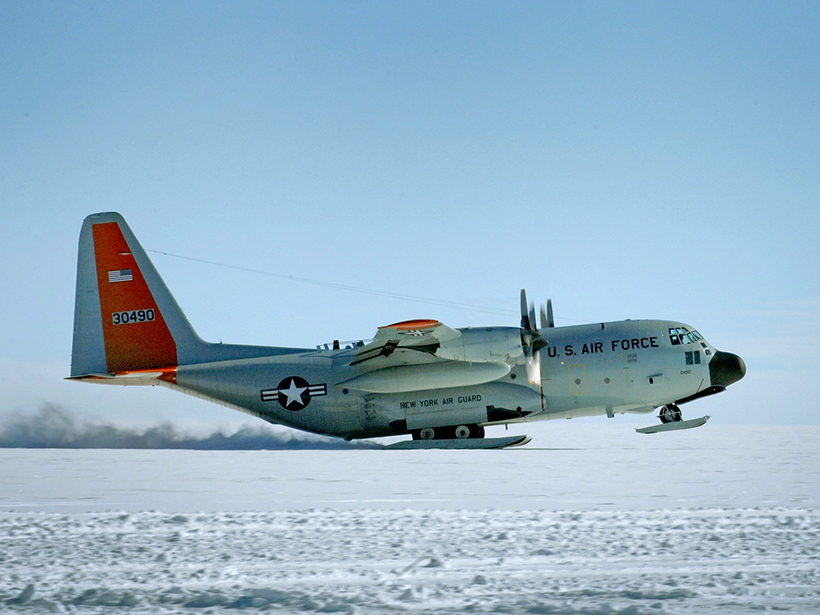 A ski-equipped plane takes off from a remote science research site on Greenland’s ice sheet.