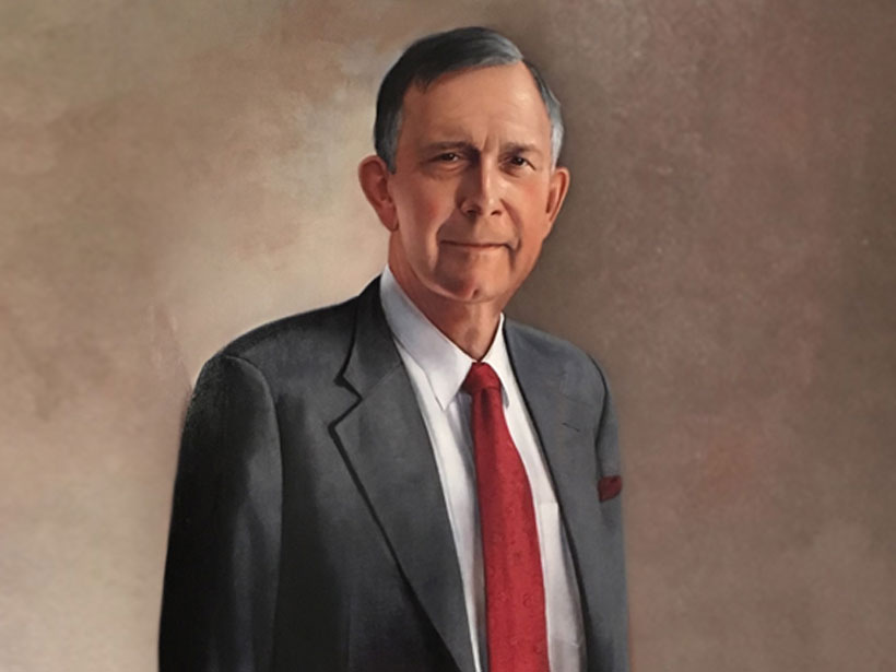 A close-up of a painting of Fred Spilhaus, executive director of the American Geophysical Union from 1970 to 2009.