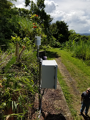 Installation of an infrasound sensor at GSN station IU-SJG in Puerto Rico.