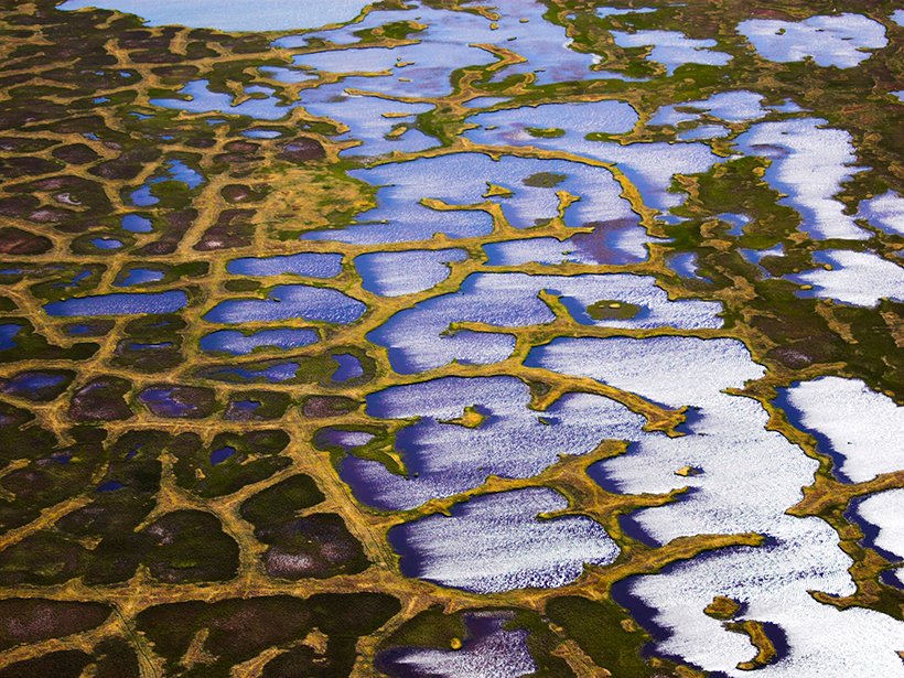 This aerial photo taken over Alaska shows one of the ways that thawing permafrost reshapes the landscape.