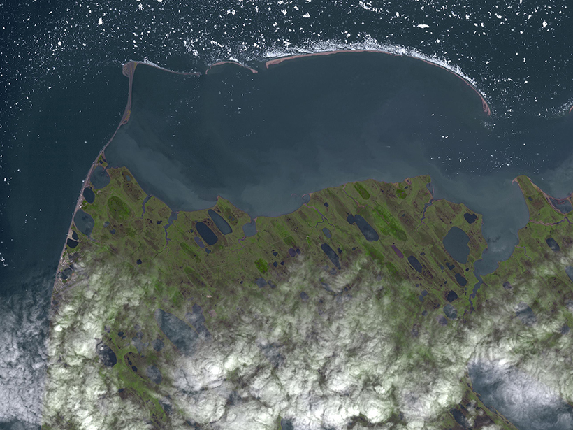 Satellite image of Point Barrow, Alaska. A 40-year record of carbon dioxide concentrations in Alaska offers insight into how the carbon cycle responds to temperature.