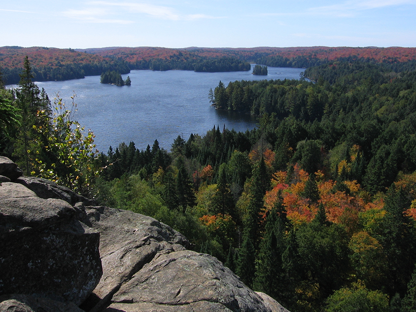 Cache Lake in Ontario, Canada, surrounded by northern hardwood forest.