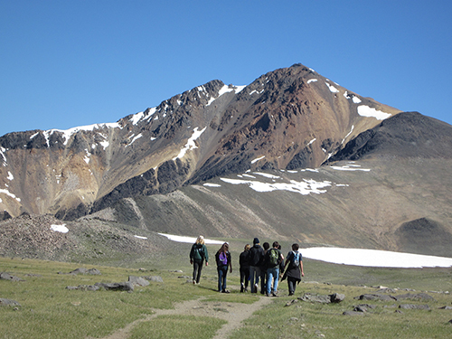 Students hike to a peak in California’s White Mountains