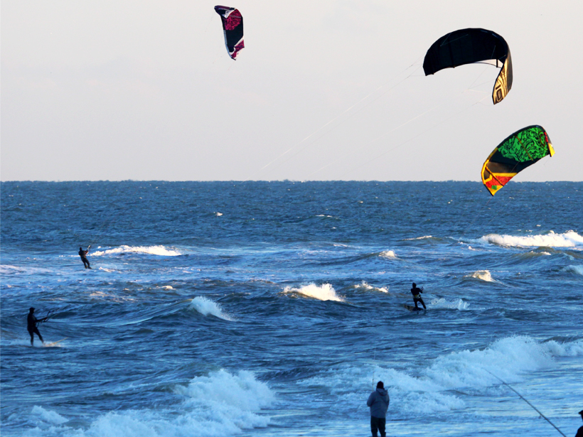 Wind surfers off the coast of Nags Head, North Carolina