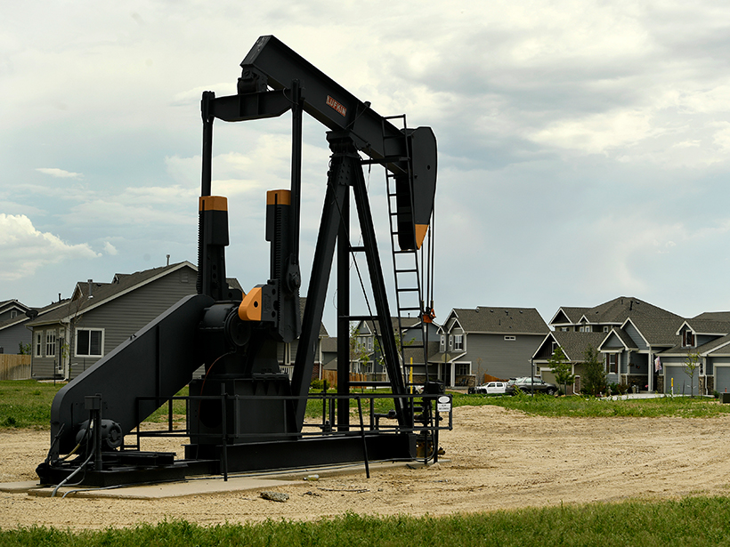 An oil derrick inside a housing development in Dacono, Colo. The photo was taken on 7 June.