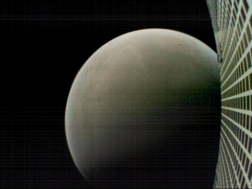Mars and WALL-E’s (MarCO-B) solar panel during flyby