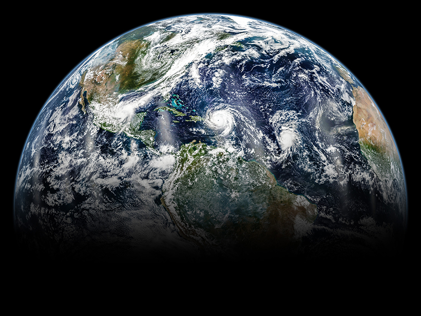 A satellite view of hurricanes swirling across Earth’s Northern Hemisphere