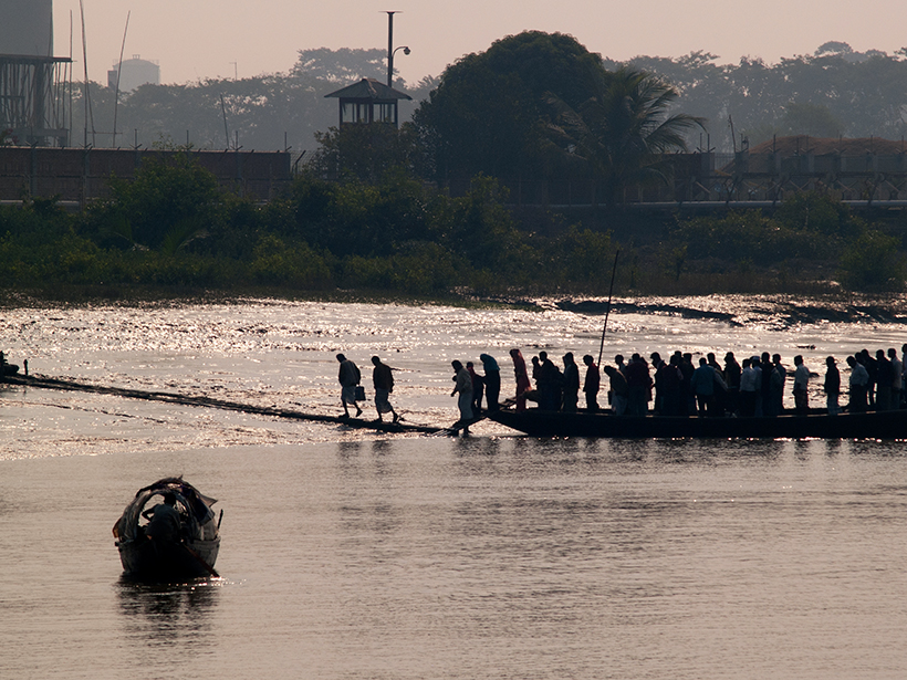 People disembarking from a ferry boat in Bangladesh