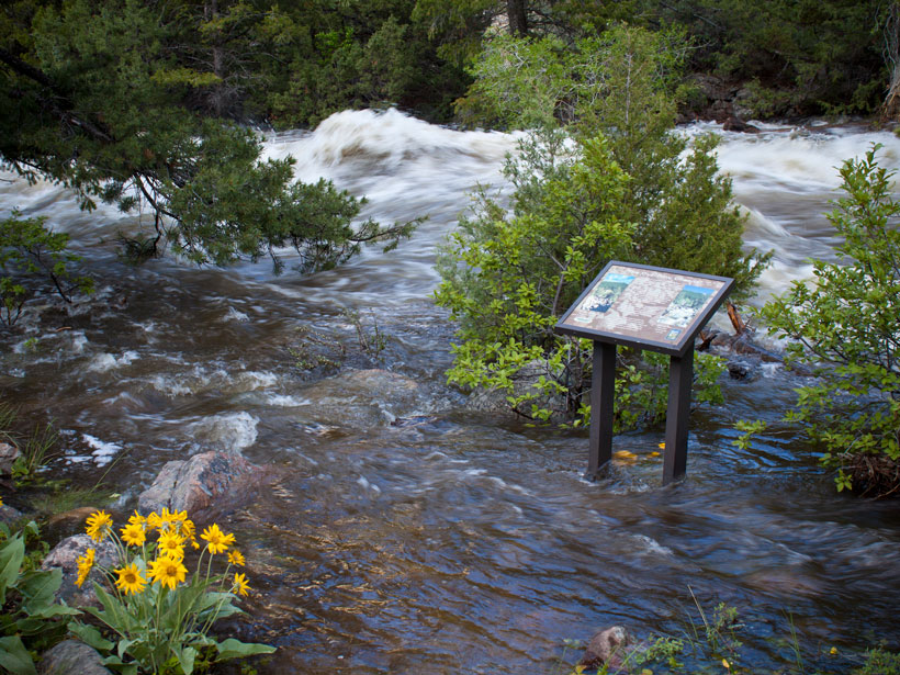Water overflows the river channel in Sinks Canyon State Park, Wyoming