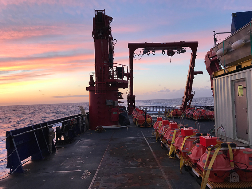 Sunset from the R/V Sikuliaq, July 2018, with broadband ocean-bottom seismometers arranged on deck